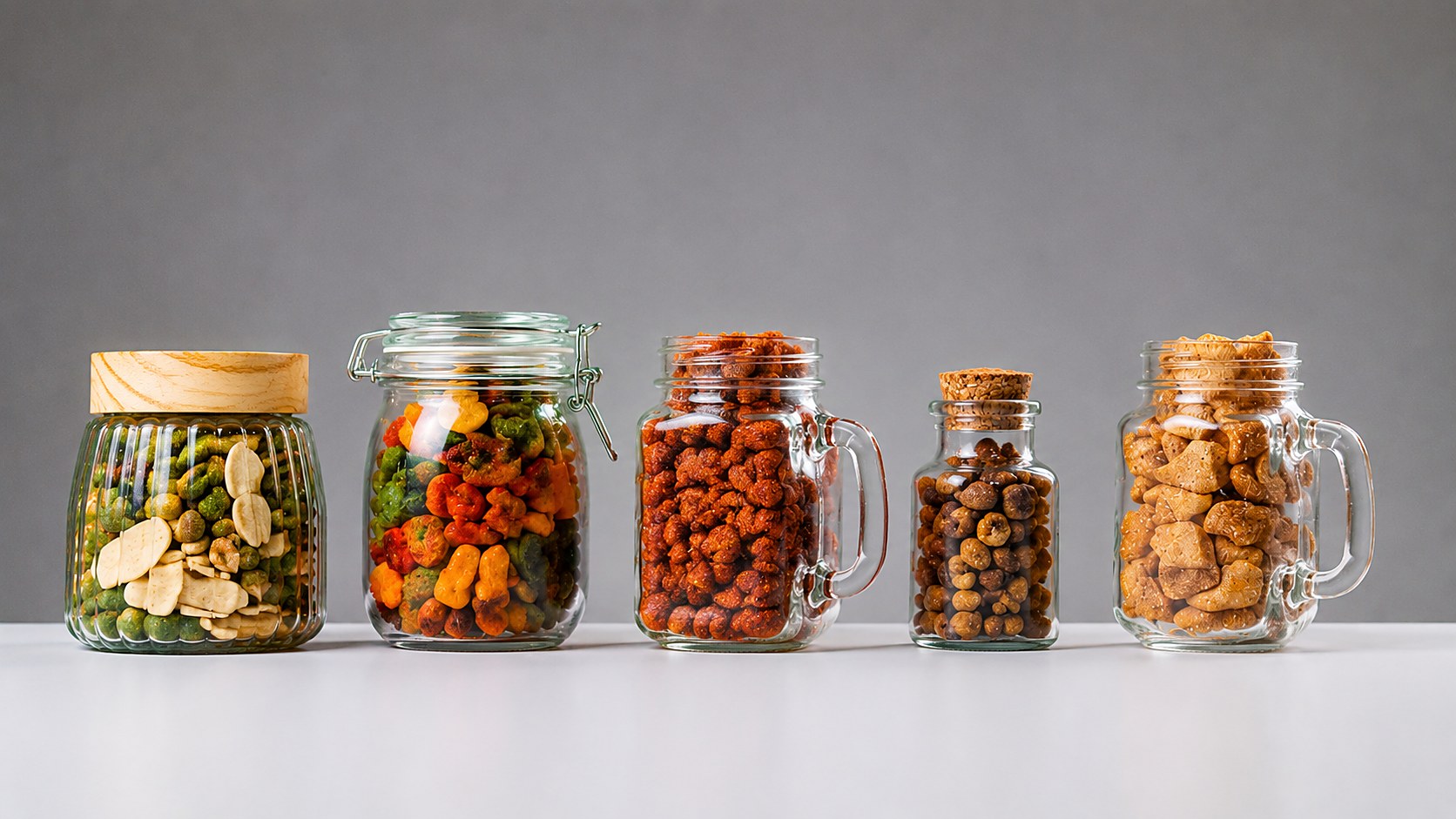 Vasi e barattoli con snack Aperigusto per il catering
